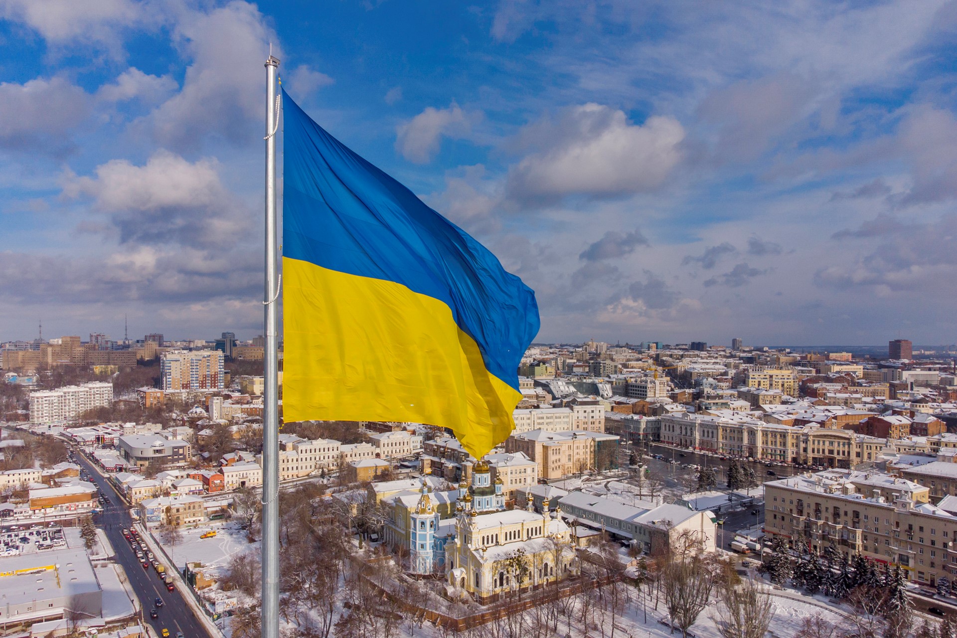 ukraine flag in front of a town